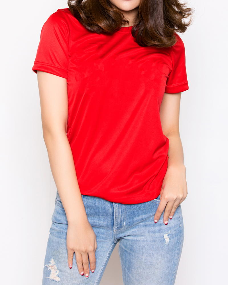 young,attractive,girl,wearing,a,red,t,shirt,standing,isolated